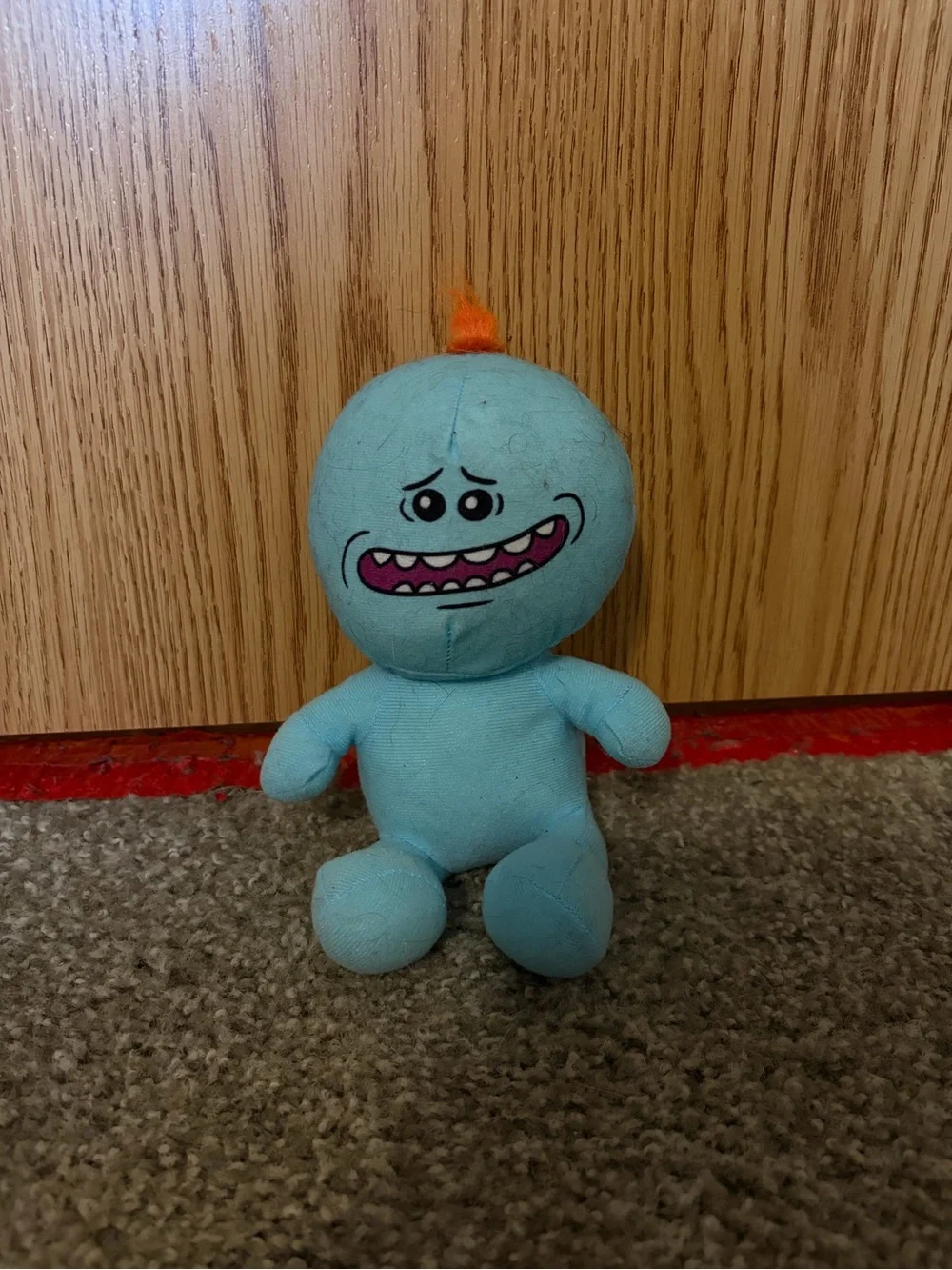 Blue Plush Character Toy with Orange Hair